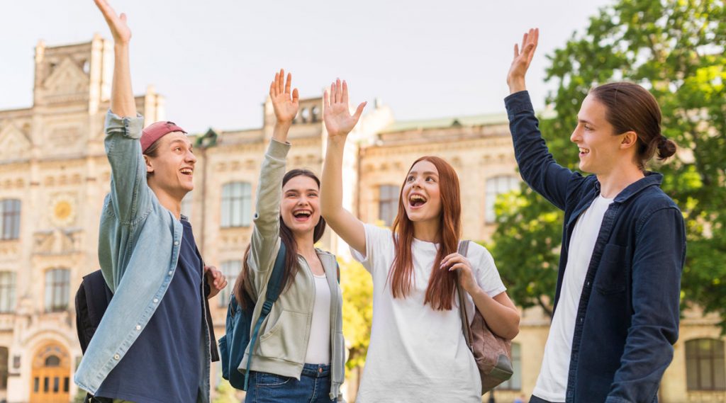 Group of students happy to be back at university.